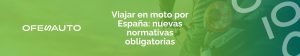 Motorista con guantes y chaleco reflectante en carretera de España